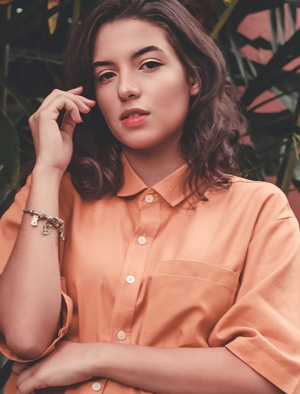 a beautiful photo with a girl carring a flower